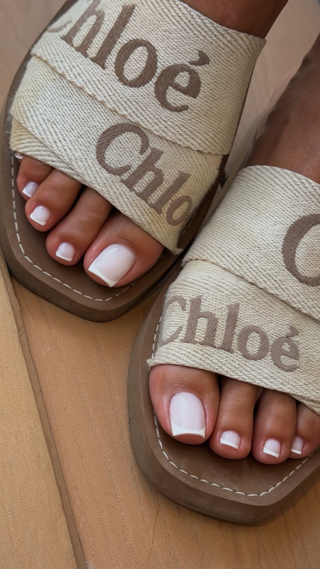 French pedicure in neutral Chloé sandals